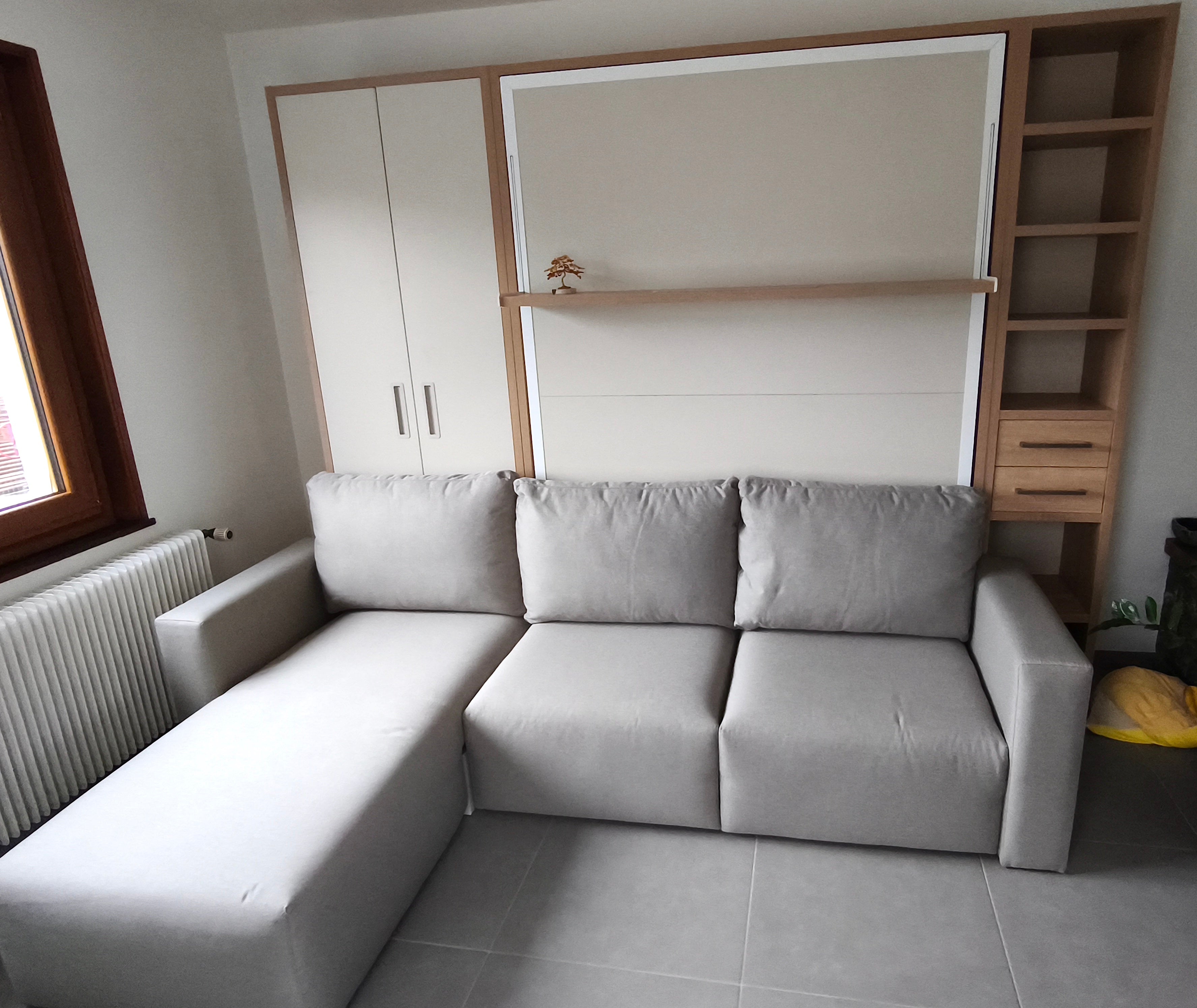 Lit escamotable canapé JOY avec méridienne installé par Modulance